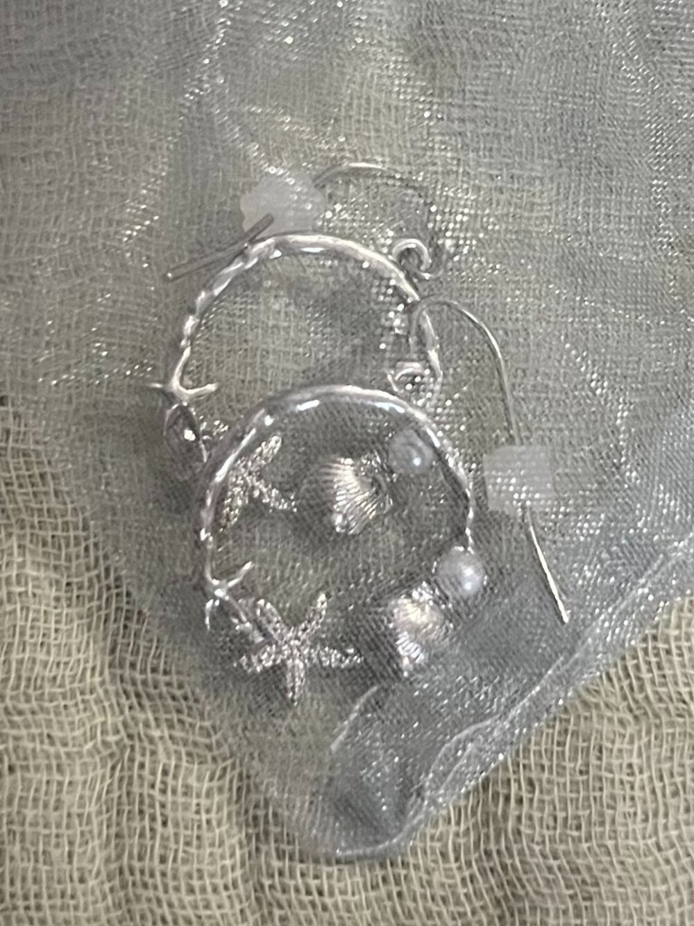 Coastal designed silver hoop dangling earrings